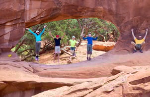 A family enjoys a hike in Utah after opening an account at Wasatch Peaks Credit Union.