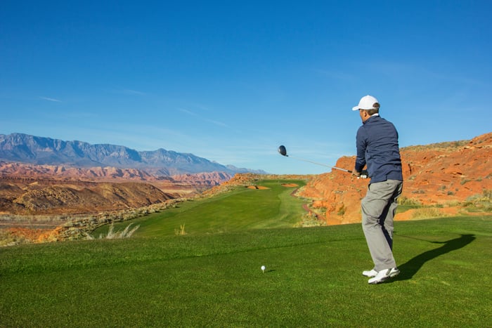 A man enjoys golf after opening a Traditional IRA.