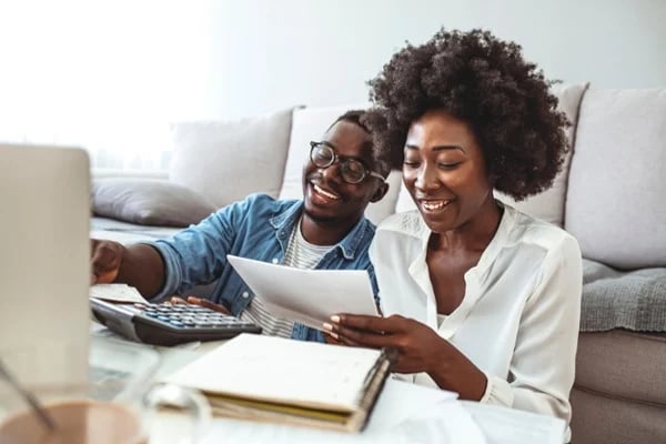 A couple choosing between a Traditional or a Roth IRA.