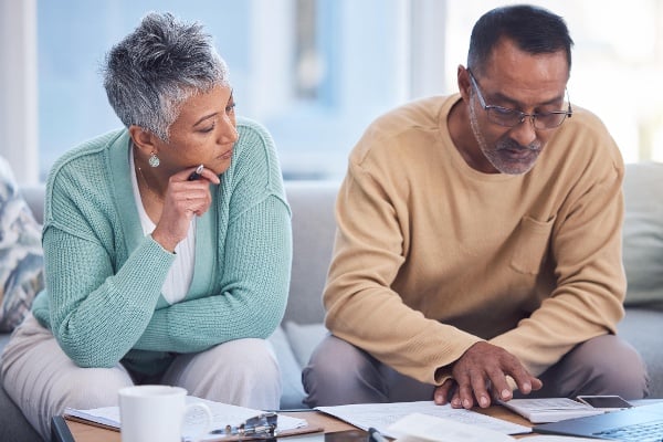 A couple compares IRA accounts.