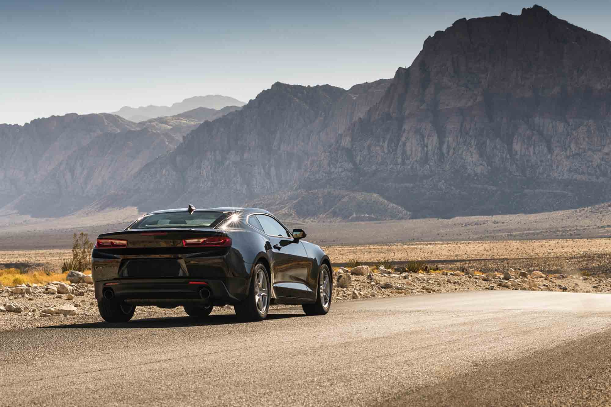 Camaro bought with new car loan driving in Utah desert