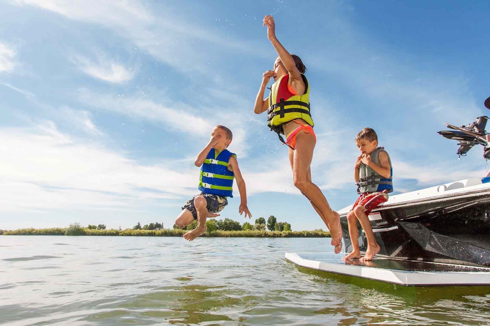 jumping-into-water-from-boat