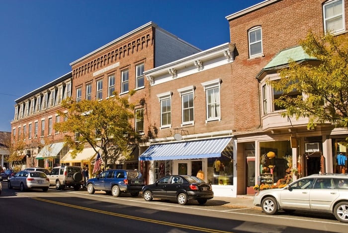 Tidy storefronts on a cheery Midwest main street. Interested in a loan for your business? Learn more about Wasatch Peaks Credit Union secured business loans.