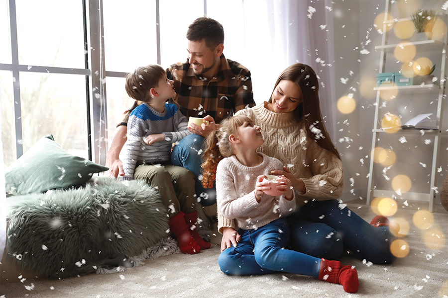 family in house with snow