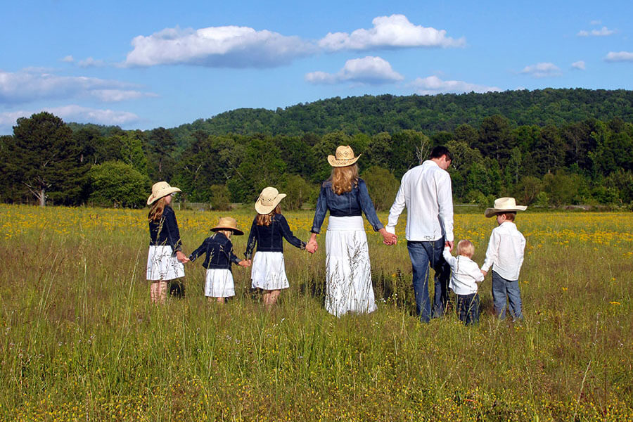 Family standing outside