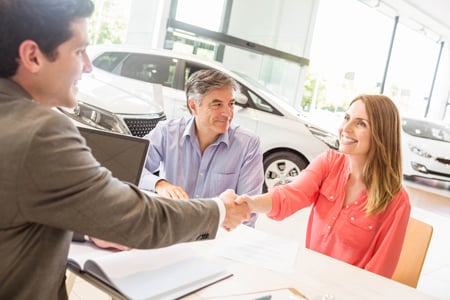 Couple at dealership