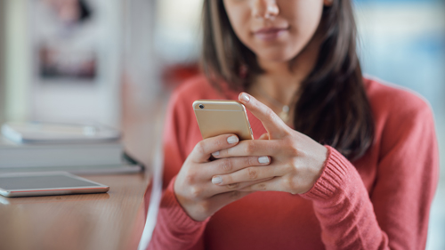 Woman looking at cell phone