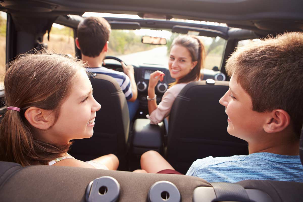 Family riding in suv