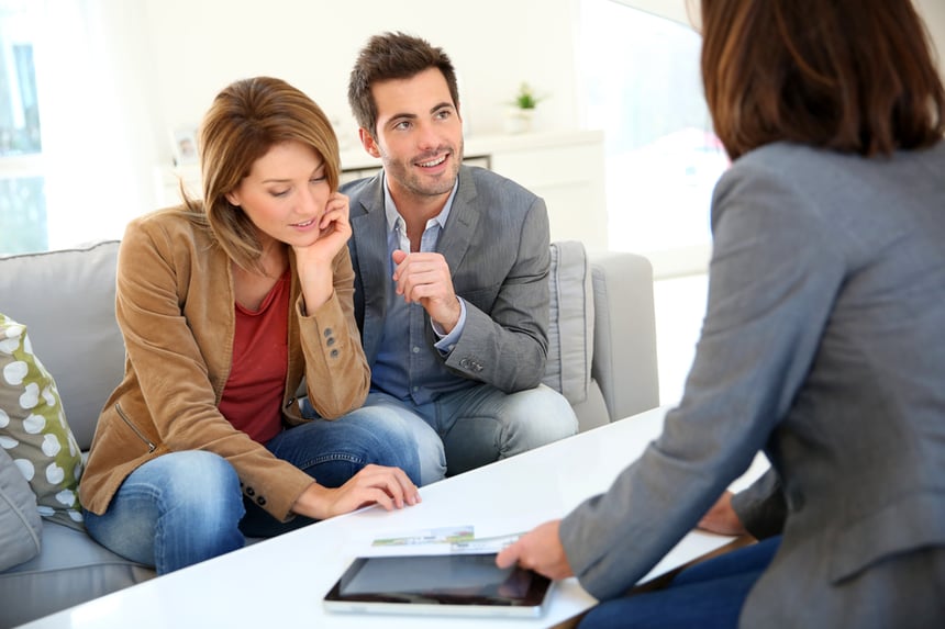 A couple discusses how to open a CD account with a financial advisor.