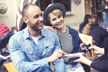 Couple paying with card