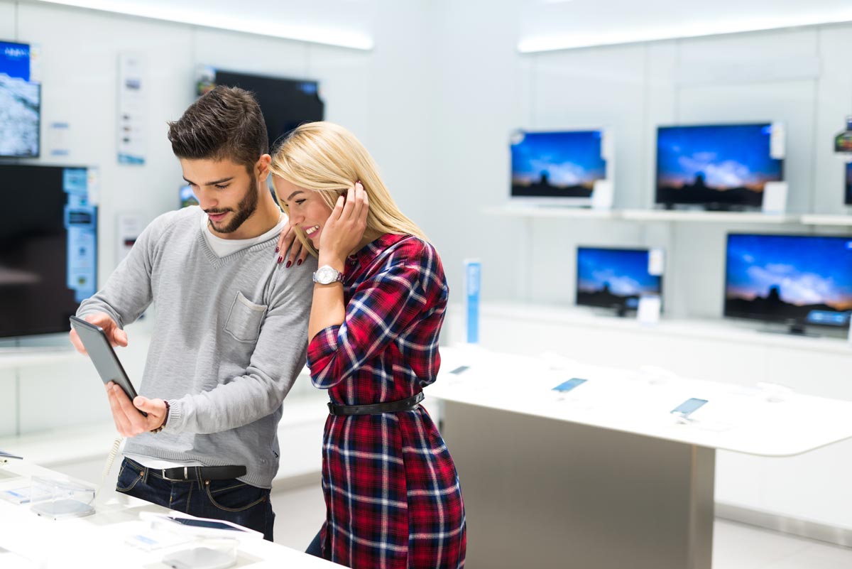 Couple in electronics store