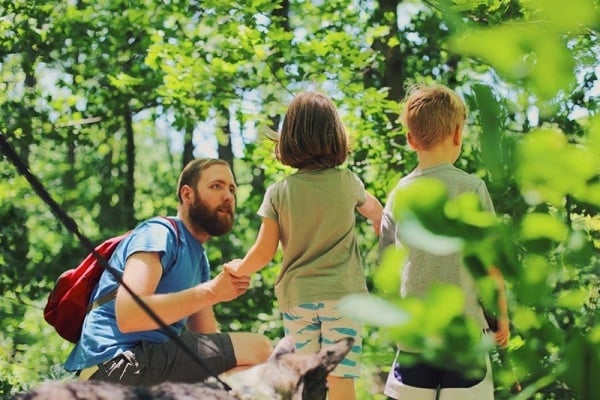 Dad and kids hiking