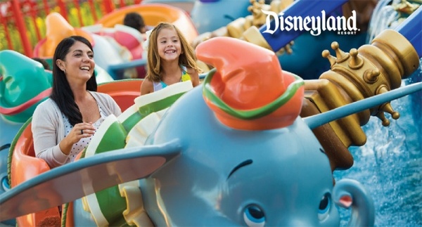 Mom and daughter in Dumbo ride at Disneyland