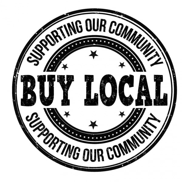 Supporting our Community, buy Local sign