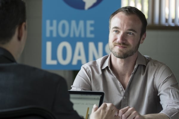 Man talking to a Mortgage Loan Officer