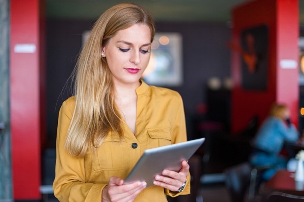 Women looking at her iPad