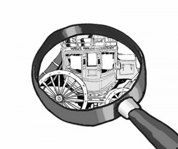 Looking at a wells cargo with magnifying glass