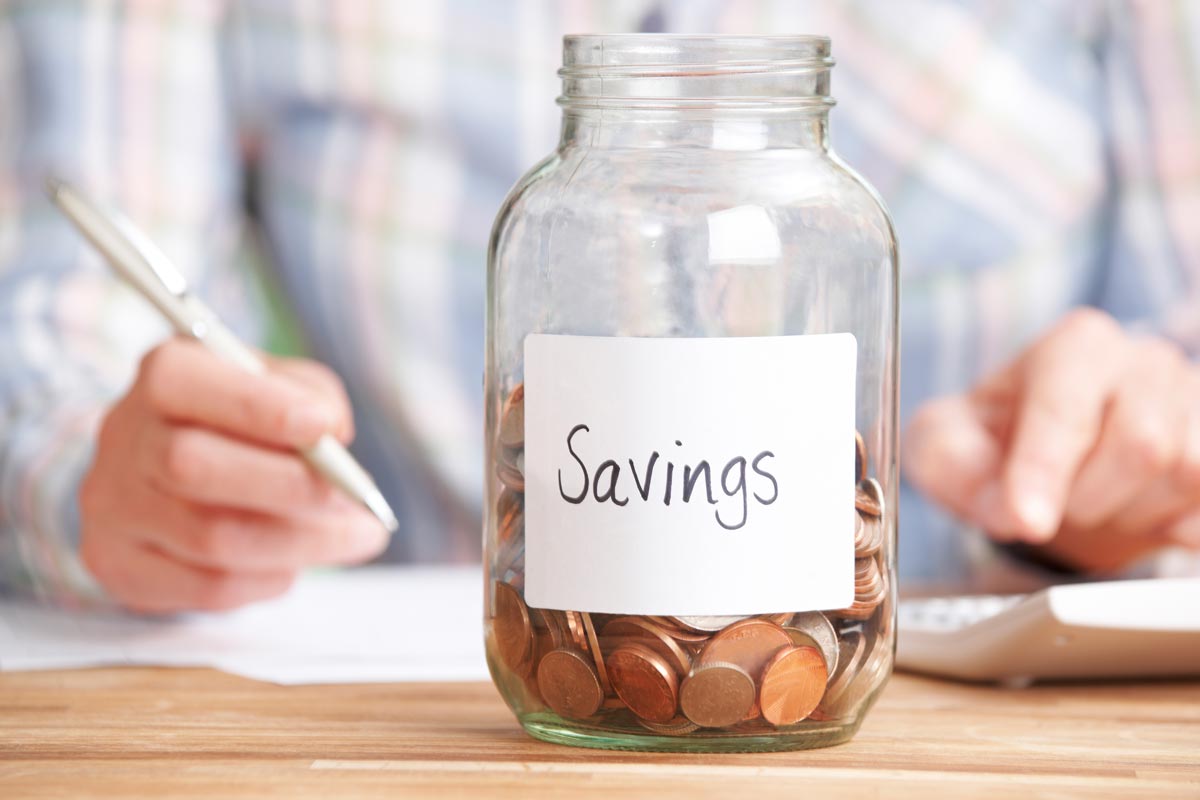 Savings jar with coin