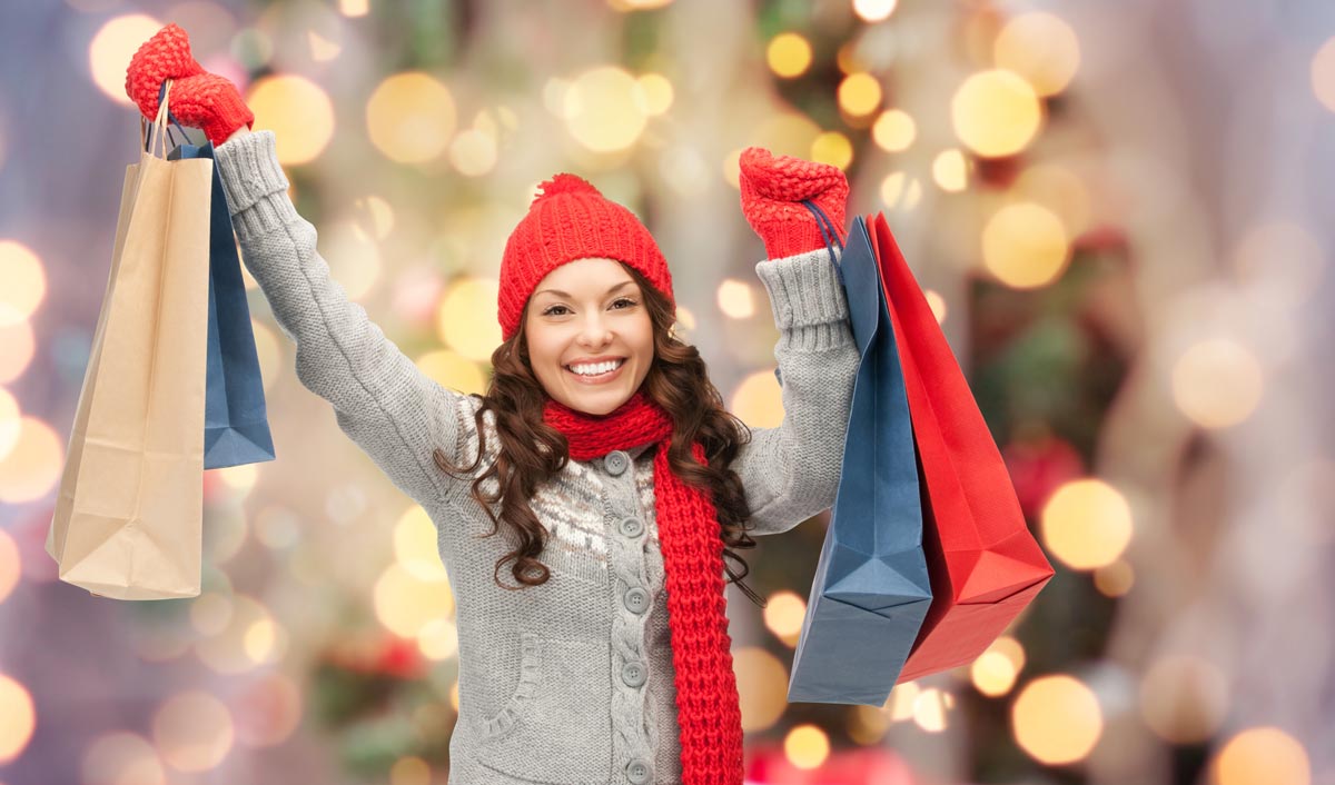 woman holding shopping bags