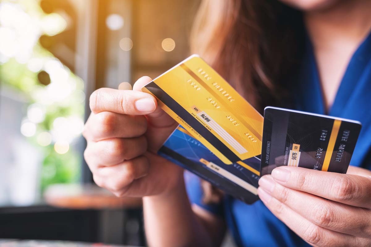 Woman choosing a credit card