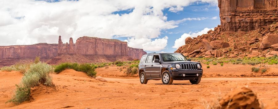 Jeep driving through terrain